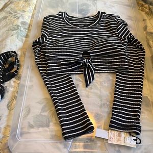 Robin Pinccone swim top and long sleeve sun tee.